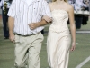 Paul Peterson walks his daughter, Michele Peterson, towards the homecoming court during the Crescenta Valley High School Home Coming Game. (Photo by Ed Hamilton / oct26, 2012)
