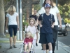 Rebekah Peterson, with her son Jacob, 9, Emma,3 and Megan, 2, in stroller.